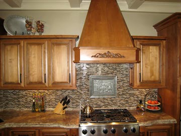stove with carved hood